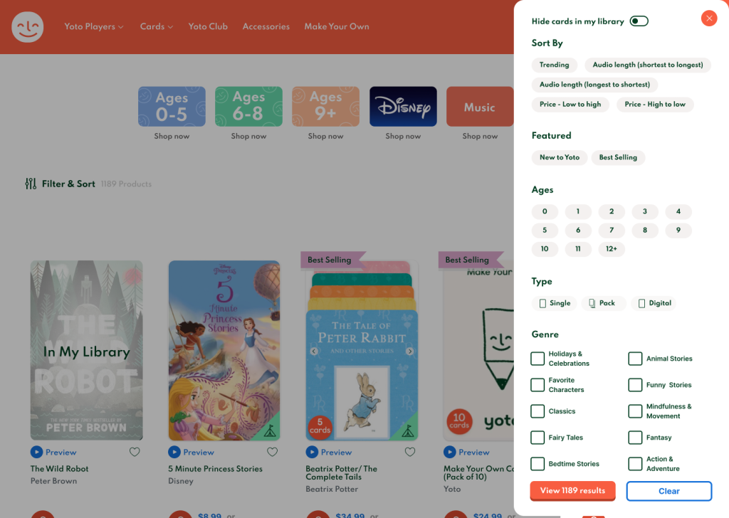 The Yoto e-commerce store with the "Filter and Sort" drawer menu open. A "Hide cards in my library" toggle appears above other "sort by" options below.